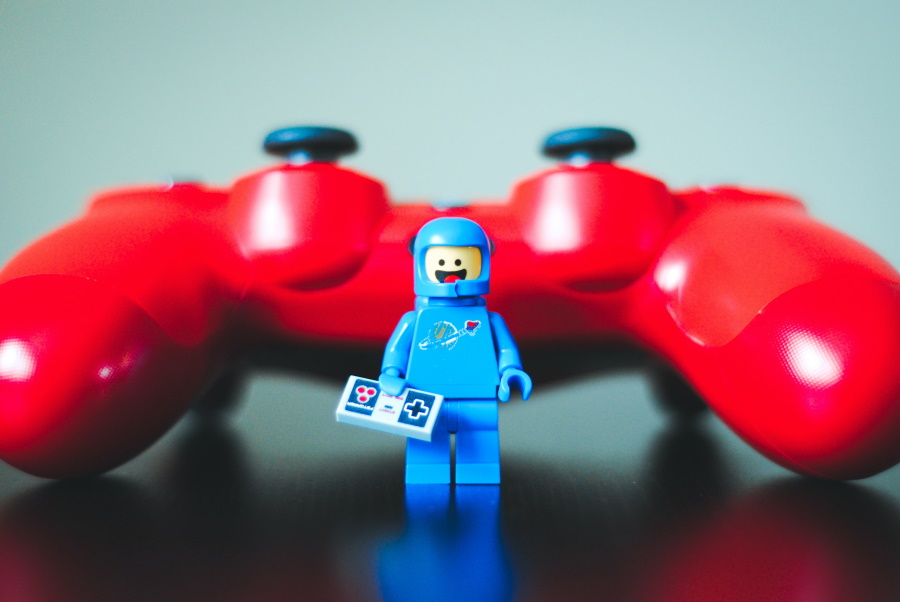 Image of a LEGO figurine dressed in a space suite with a happy expression